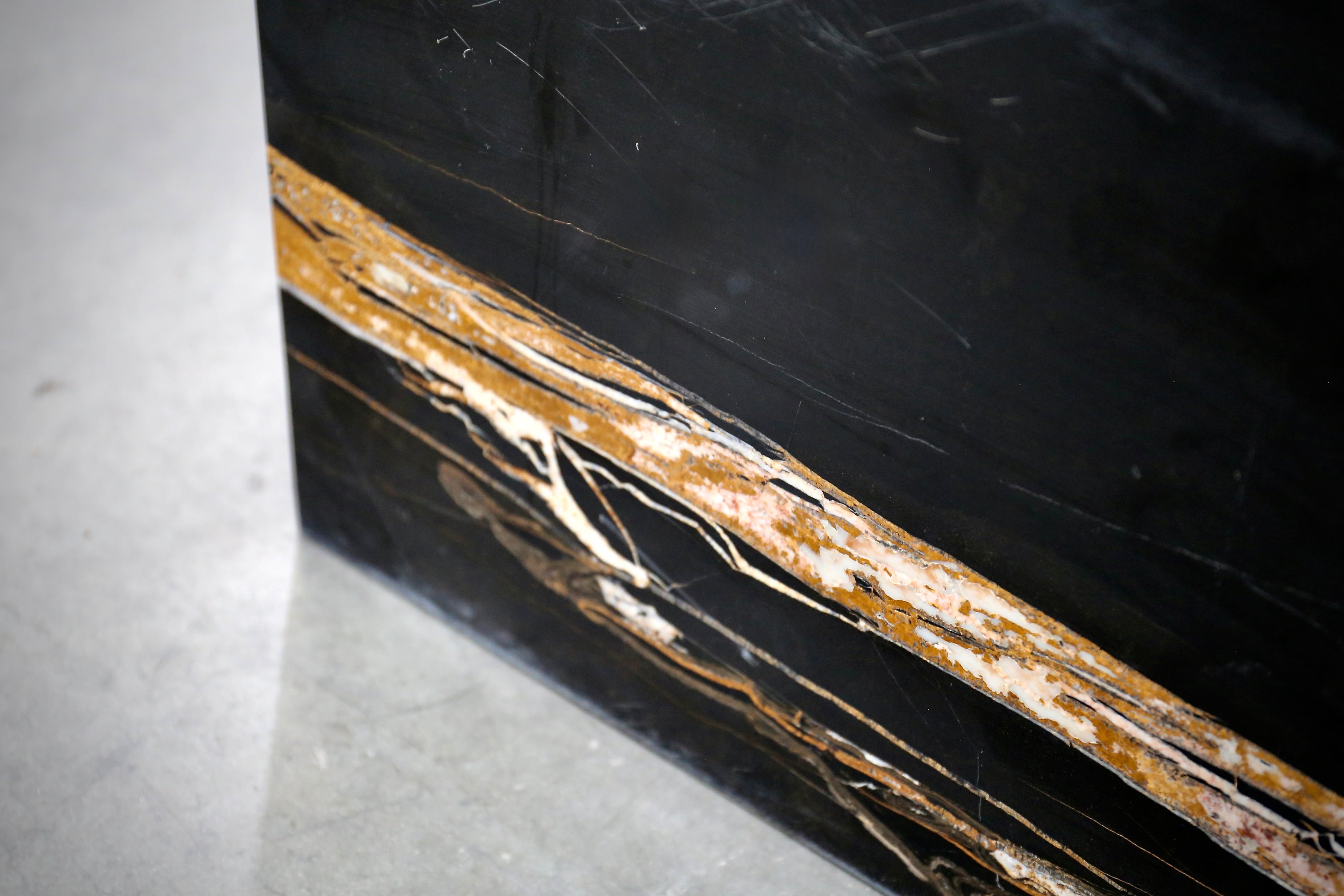 Puzzle Coffee Table in Sahara Noir & Travertine